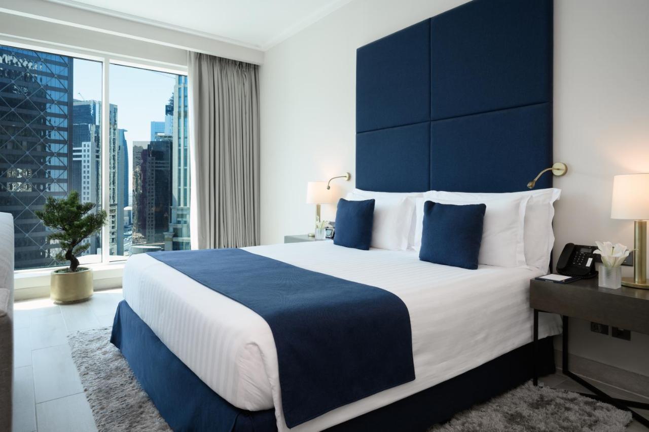 Centara West Bay Hotel & Residences 도하 외부 사진 A bedroom at the hotel