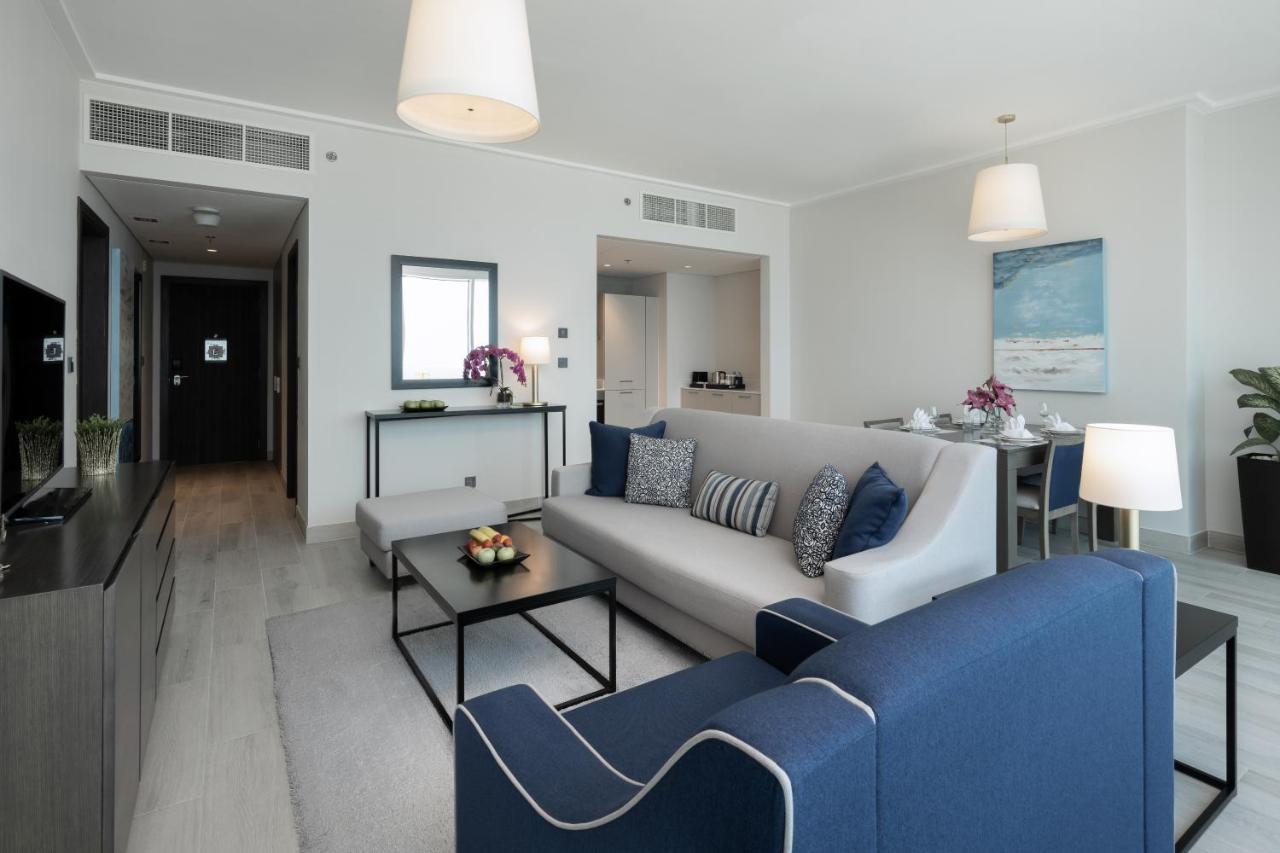 Centara West Bay Hotel & Residences 도하 외부 사진 A living room at the Address Downtown Hotel