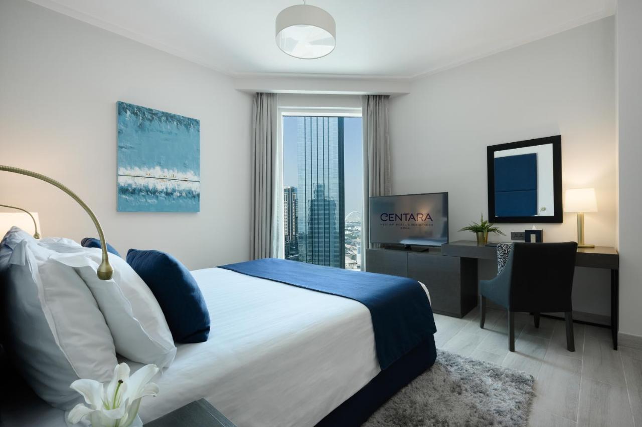 Centara West Bay Hotel & Residences 도하 외부 사진 A bedroom at the hotel