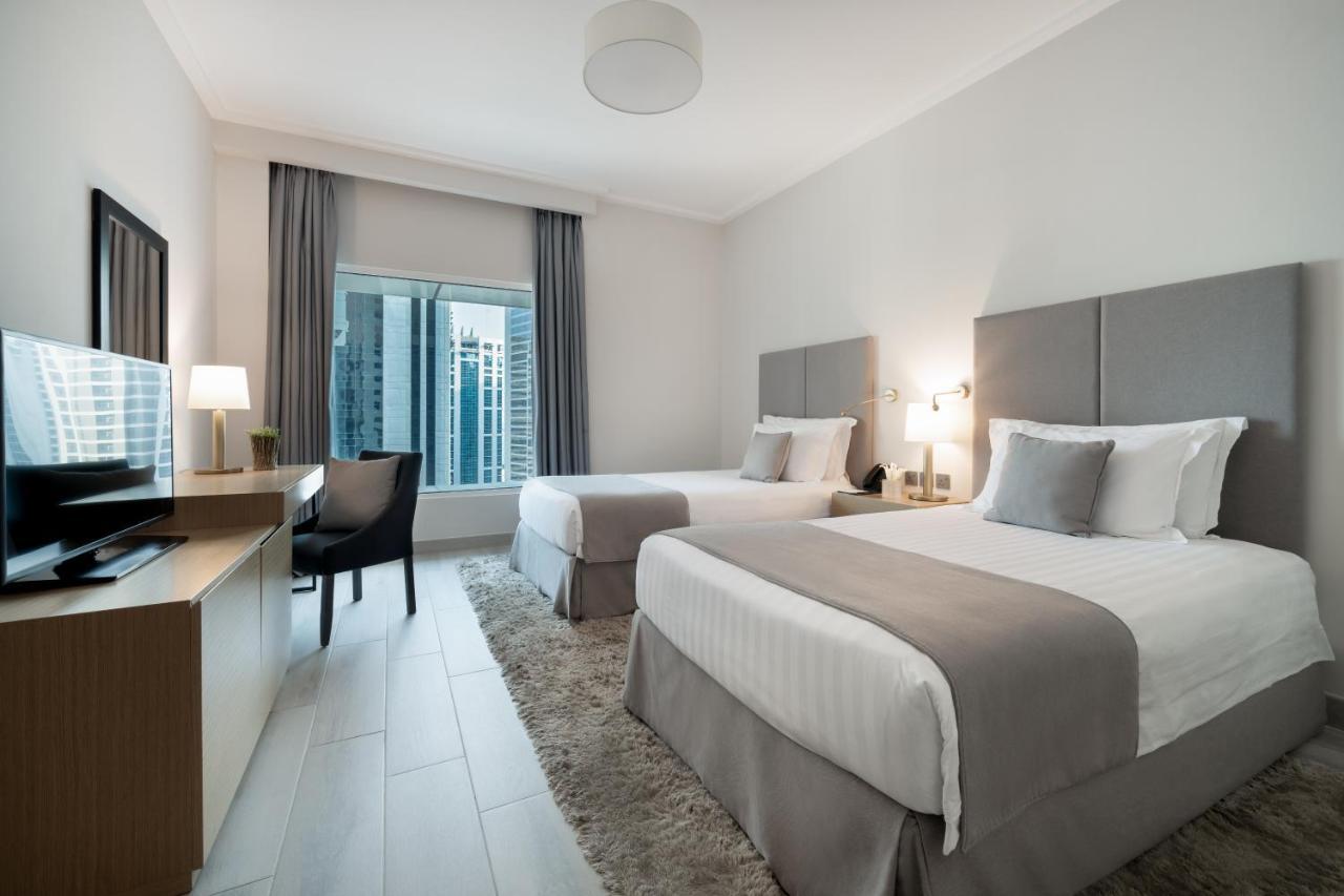 Centara West Bay Hotel & Residences 도하 외부 사진 A typical guest room at the hotel
