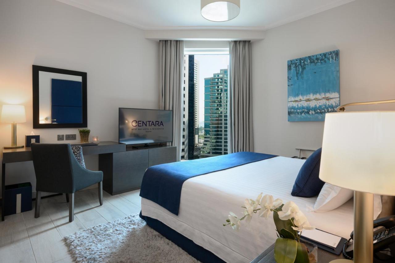 Centara West Bay Hotel & Residences 도하 외부 사진 A bedroom at the hotel