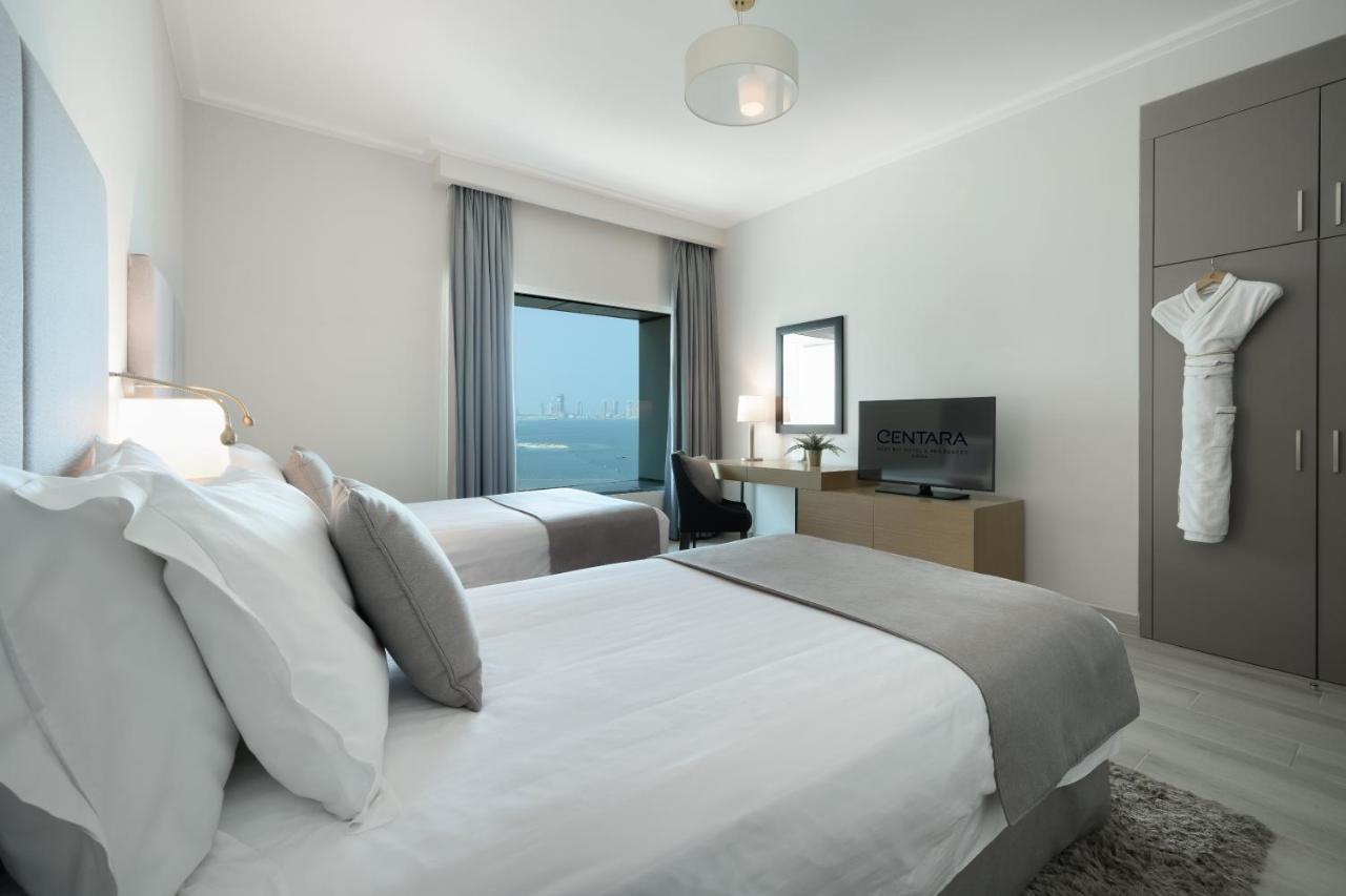 Centara West Bay Hotel & Residences 도하 외부 사진 A bedroom at the hotel